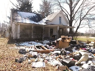 House with outdoor trash